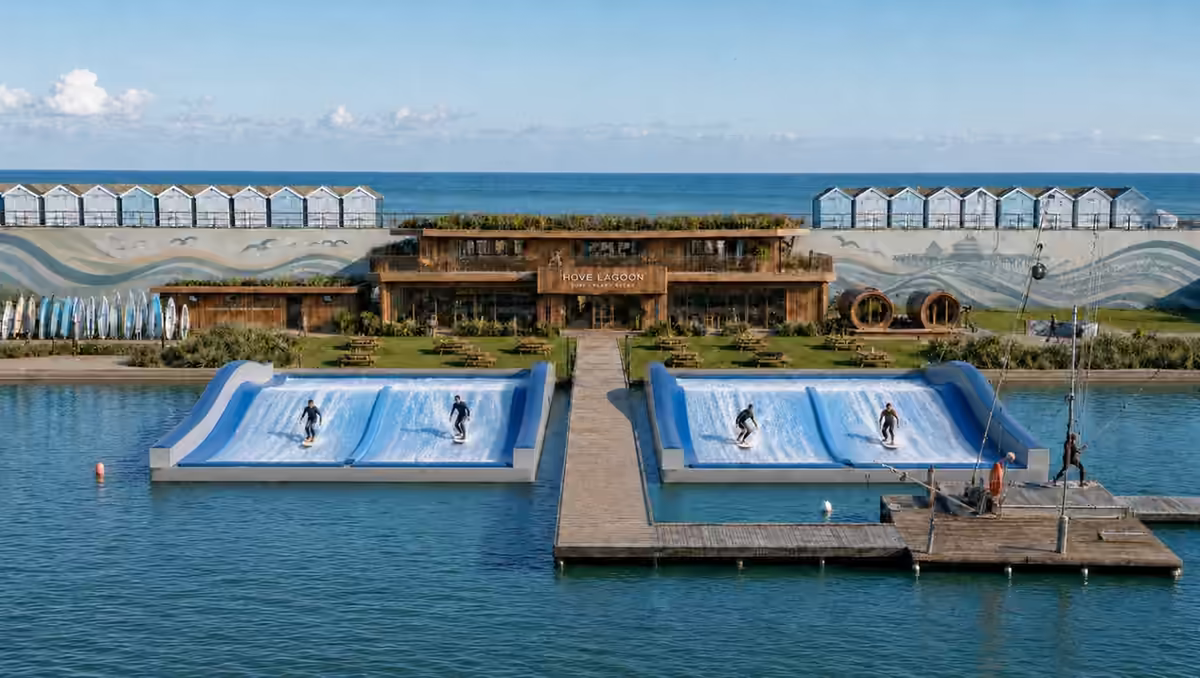 Concept render of Hove Lagoon by day: two surf machines, a boardwalk, the wakeboard cable and the clubhouse with seafront beach huts behind